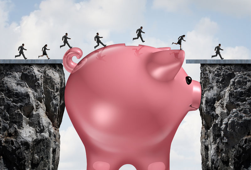 people jumping over a canyon filled by a piggy bank acting as a bridge to explain a commercial bridge loan